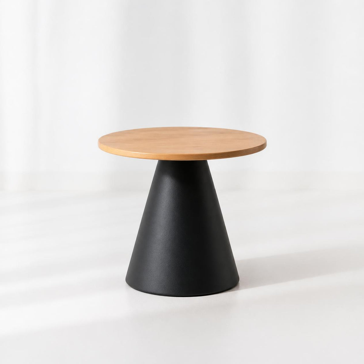 The CONIA N – Round Cone-Base Table