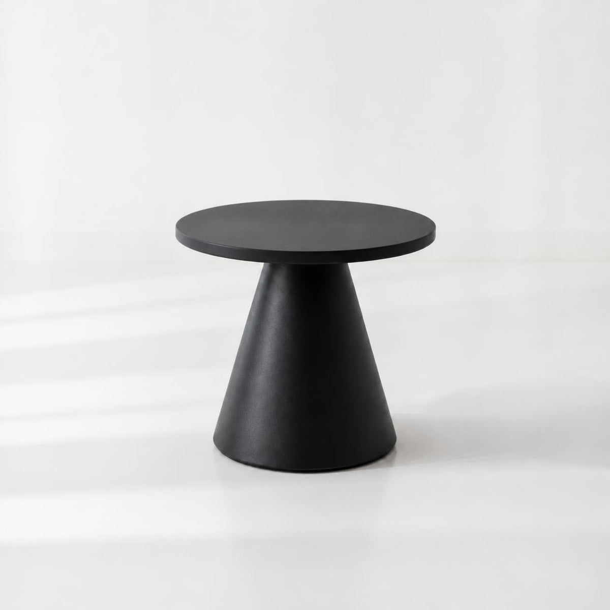 The CONIA N – Round Cone-Base Table
